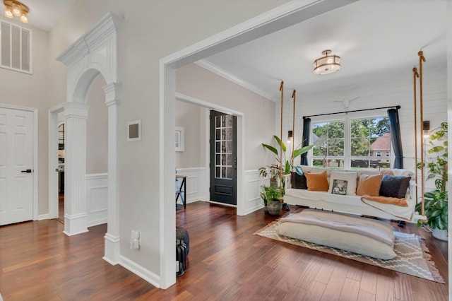 1016 Nealcrest Cir, Spring Hill, TN 37174 - sitting room with wood finished floors, ornate columns, crown molding, wainscoting, and a decorative wall
