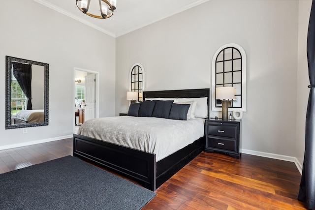 1016 Nealcrest Cir, Spring Hill, TN 37174 - bedroom with crown molding, a chandelier, dark wood finished floors, and a towering ceiling