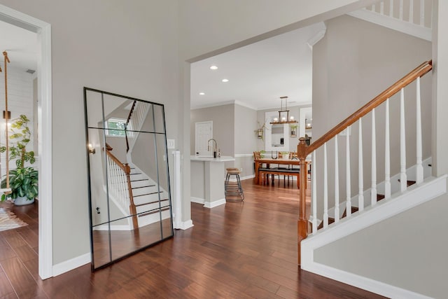 1016 Nealcrest Cir, Spring Hill, TN 37174 - foyer entrance with stairway, dark wood-style floors, ornamental molding, a chandelier, and recessed lighting