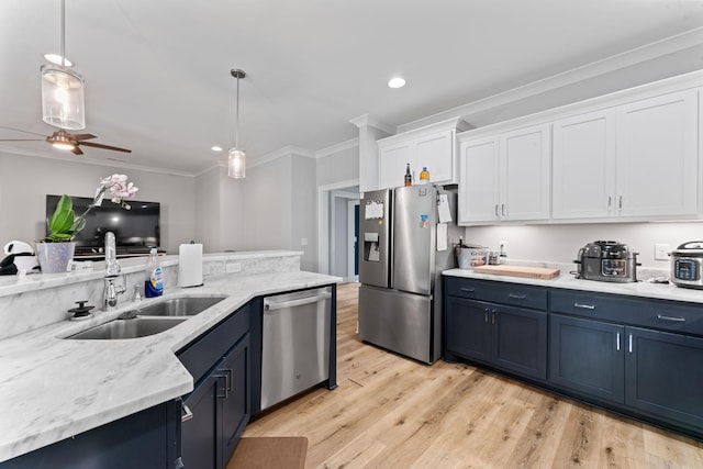 2428 Sandstone Cir, Murfreesboro, TN 37130 - kitchen featuring stainless steel appliances, white cabinets, crown molding, decorative light fixtures, and blue cabinets