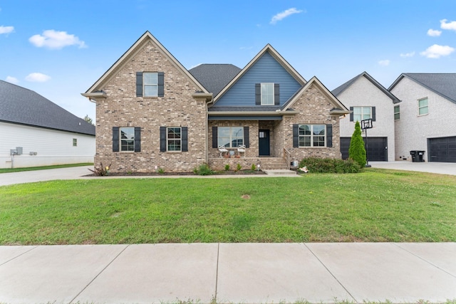 2428 Sandstone Cir, Murfreesboro, TN 37130 - view of front of house featuring brick siding, a front yard, a garage, and concrete driveway