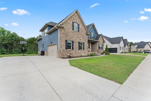 2428 Sandstone Cir, Murfreesboro, TN 37130 - view of front facade featuring brick siding, a front lawn, driveway, and an attached garage