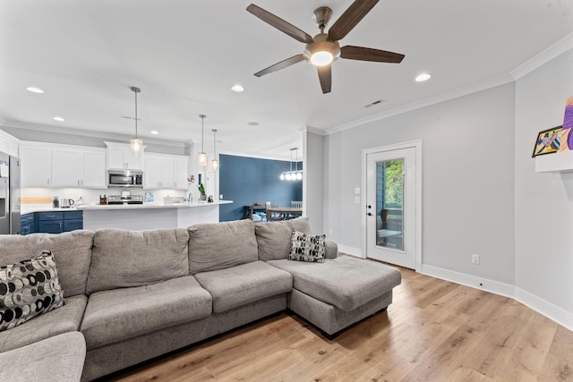 2428 Sandstone Cir, Murfreesboro, TN 37130 - living area with a ceiling fan, crown molding, recessed lighting, light wood-style flooring, and a chandelier