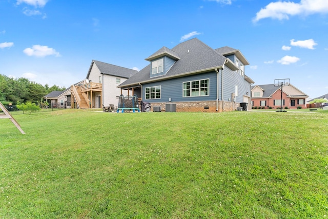 2428 Sandstone Cir, Murfreesboro, TN 37130 - rear view of property featuring a yard, brick siding, and a shingled roof
