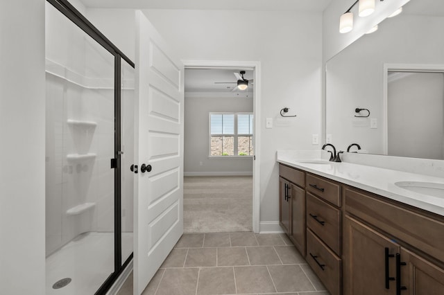 522 Rohan Dr, Murfreesboro, TN 37129 - bathroom featuring double vanity, ceiling fan, a stall shower, and tile patterned floors