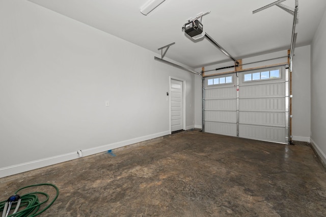 522 Rohan Dr, Murfreesboro, TN 37129 - garage featuring a garage door opener and baseboards