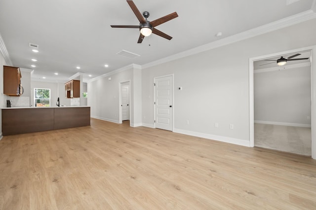 522 Rohan Dr, Murfreesboro, TN 37129 - unfurnished living room featuring a ceiling fan, crown molding, recessed lighting, and light wood finished floors