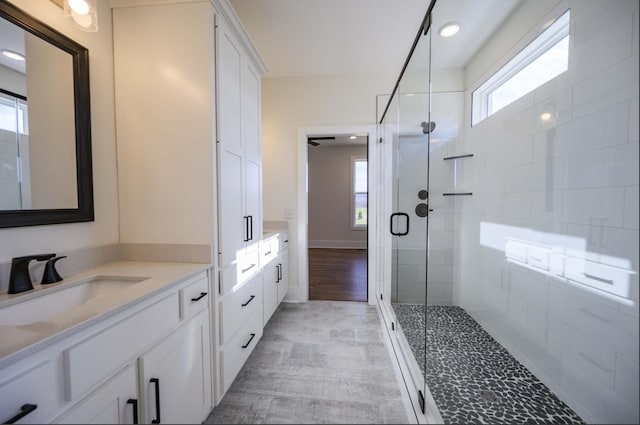 150 Bryson Ln, Castalian Springs, TN 37031 - bathroom with vanity, a stall shower, and recessed lighting