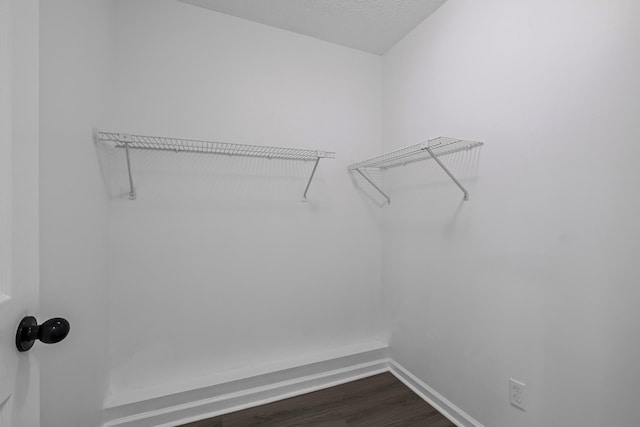 1300 Cadogan Way, Antioch, TN 37013 - spacious closet featuring dark wood-type flooring