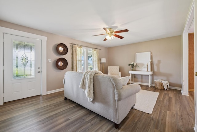 2274 Indian Mound Rd, Woodlawn, TN 37191 - living area featuring a ceiling fan and dark wood-style flooring