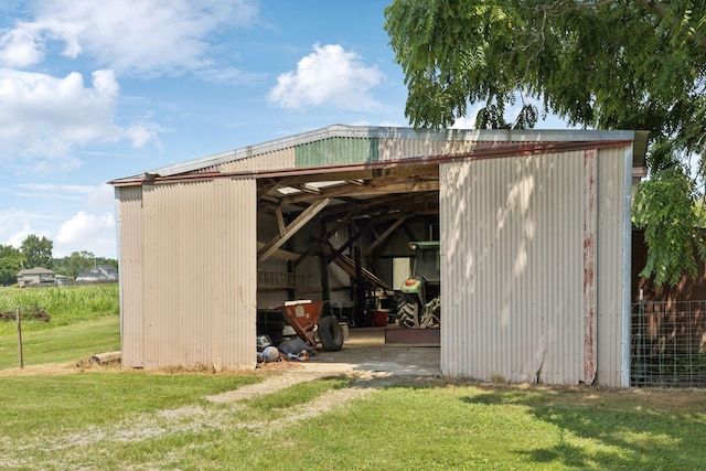 2274 Indian Mound Rd, Woodlawn, TN 37191 - view of pole building featuring a lawn