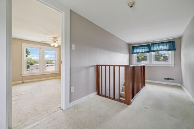 2274 Indian Mound Rd, Woodlawn, TN 37191 - corridor featuring carpet floors and an upstairs landing
