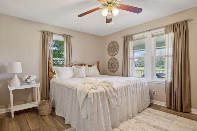 2274 Indian Mound Rd, Woodlawn, TN 37191 - bedroom with wood finished floors and a ceiling fan