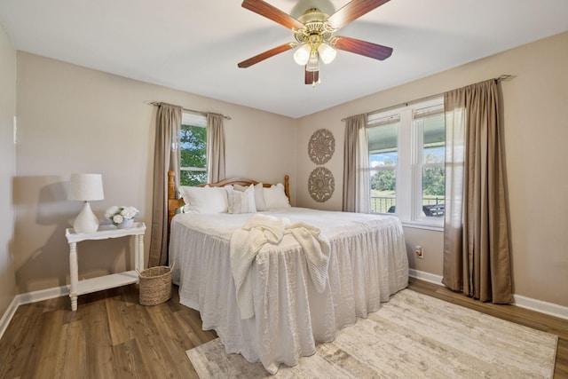 2274 Indian Mound Rd, Woodlawn, TN 37191 - bedroom with wood finished floors and ceiling fan