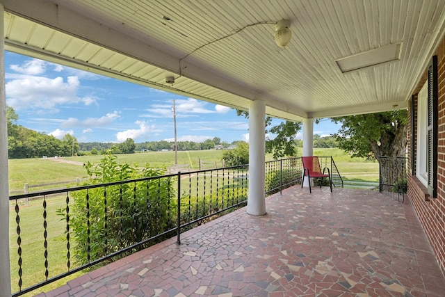 2274 Indian Mound Rd, Woodlawn, TN 37191 - covered porch with a view of rural / pastoral area and view of scattered trees