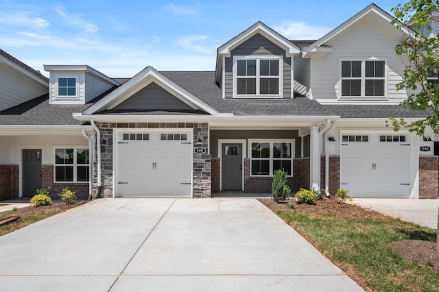 508 Rohan Dr, Murfreesboro, TN 37129 - craftsman-style home with concrete driveway, a shingled roof, and brick siding