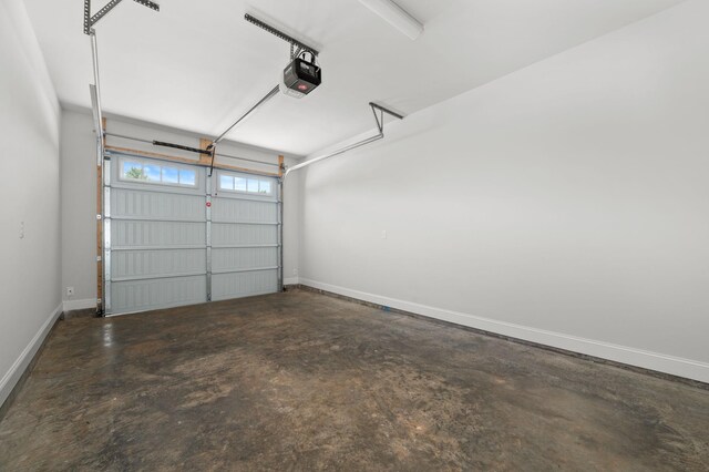 508 Rohan Dr, Murfreesboro, TN 37129 - garage with a garage door opener and baseboards