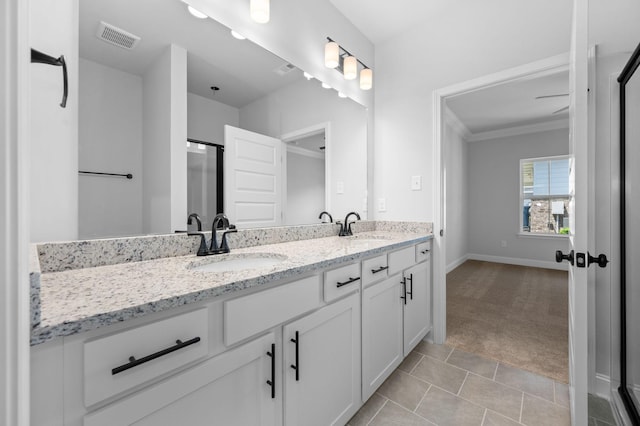 508 Rohan Dr, Murfreesboro, TN 37129 - bathroom featuring double vanity, ornamental molding, and tile patterned floors