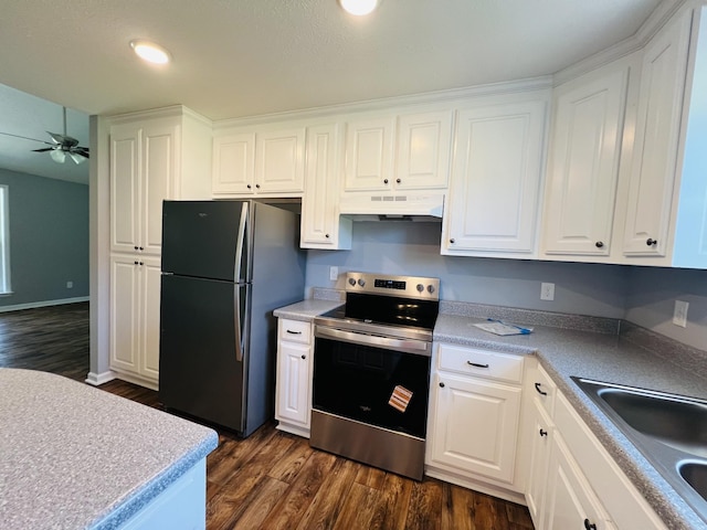 301 Union Hollow Rd, Petersburg, TN 37144 - kitchen featuring freestanding refrigerator, stainless steel range with electric stovetop, under cabinet range hood, ceiling fan, and white cabinets