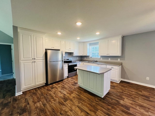 301 Union Hollow Rd, Petersburg, TN 37144 - kitchen featuring stainless steel appliances, dark wood finished floors, white cabinets, light countertops, and recessed lighting