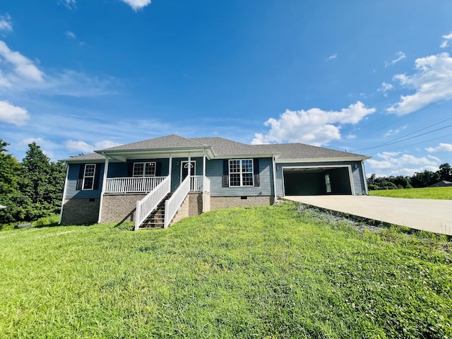 301 Union Hollow Rd, Petersburg, TN 37144 - ranch-style house with an attached garage, driveway, a porch, and a front lawn