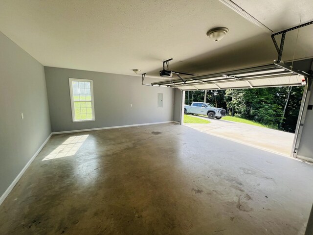 301 Union Hollow Rd, Petersburg, TN 37144 - garage with a garage door opener and electric panel