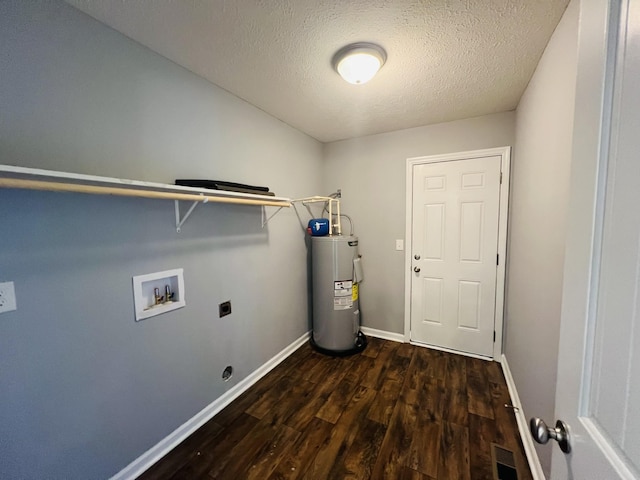 301 Union Hollow Rd, Petersburg, TN 37144 - washroom featuring electric water heater, electric dryer hookup, wood finished floors, hookup for a washing machine, and a textured ceiling