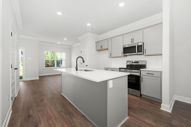 510 Rohan Dr, Murfreesboro, TN 37129 - kitchen with stainless steel appliances, gray cabinetry, dark wood-style flooring, crown molding, and a center island with sink