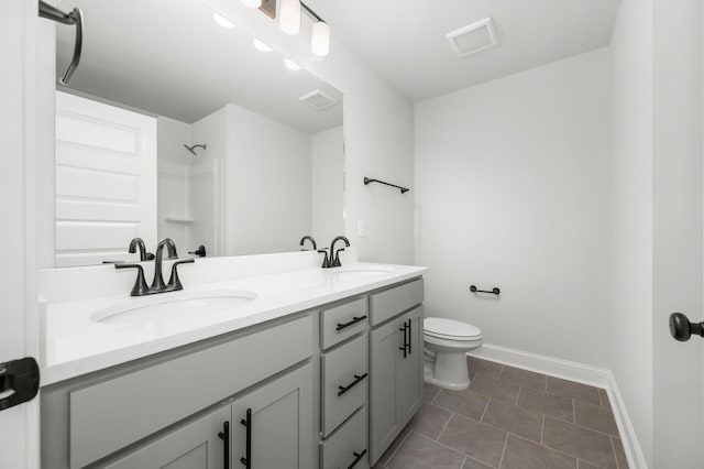 510 Rohan Dr, Murfreesboro, TN 37129 - bathroom with double vanity, tile patterned floors, and a shower