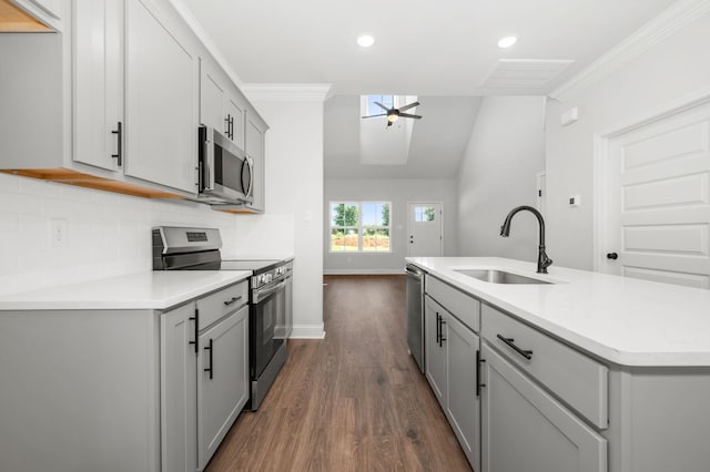 510 Rohan Dr, Murfreesboro, TN 37129 - kitchen with stainless steel appliances, gray cabinetry, decorative backsplash, ornamental molding, and recessed lighting