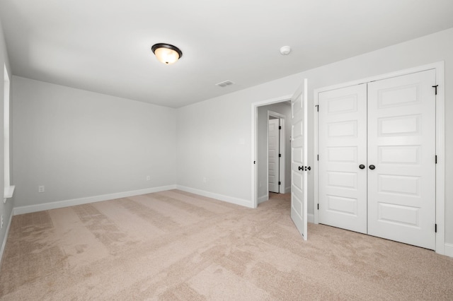 510 Rohan Dr, Murfreesboro, TN 37129 - unfurnished bedroom with light colored carpet and a closet