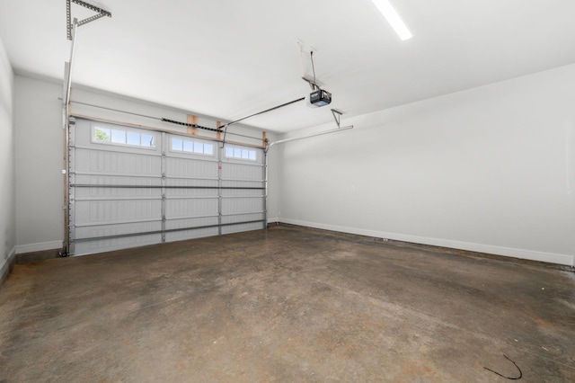 510 Rohan Dr, Murfreesboro, TN 37129 - garage featuring a garage door opener and baseboards
