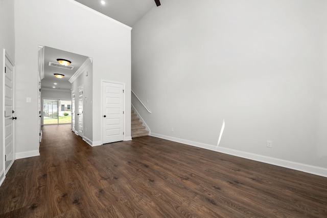 512 Rohan Dr, Murfreesboro, TN 37129 - foyer with stairway, dark wood-style floors, crown molding, and vaulted ceiling