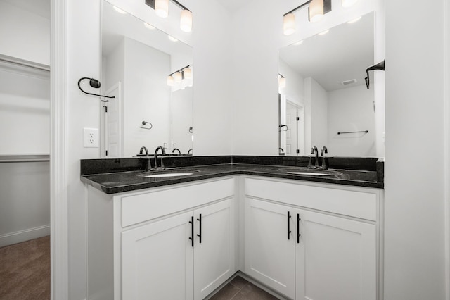 512 Rohan Dr, Murfreesboro, TN 37129 - bathroom with double vanity and a walk in closet