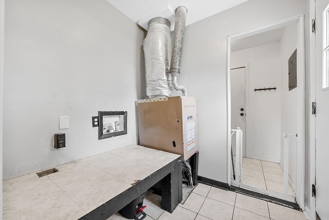 211 Navaho Trl, Hopkinsville, KY 42240 - laundry room featuring light tile patterned floors
