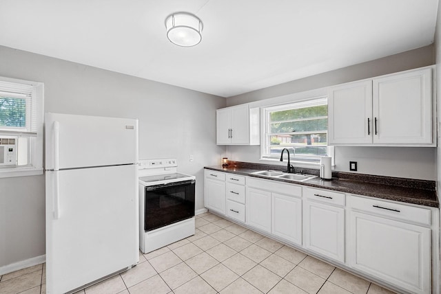 211 Navaho Trl, Hopkinsville, KY 42240 - kitchen featuring white appliances, dark countertops, white cabinetry, light tile patterned flooring, and cooling unit