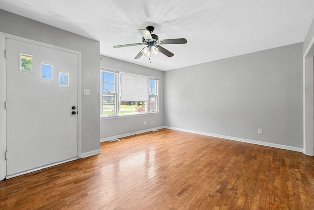 211 Navaho Trl, Hopkinsville, KY 42240 - foyer entrance with healthy amount of natural light, ceiling fan, and wood finished floors
