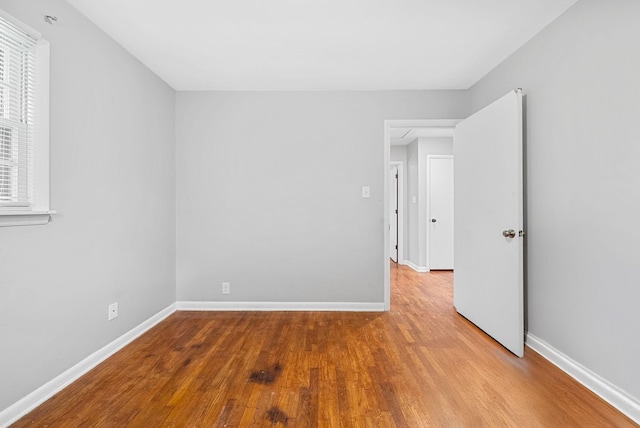 211 Navaho Trl, Hopkinsville, KY 42240 - empty room with wood finished floors and baseboards