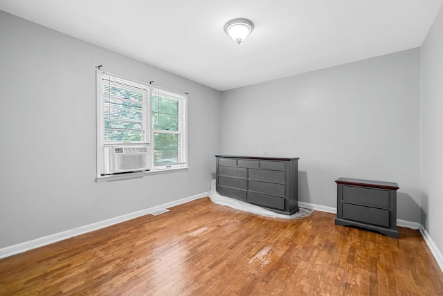 211 Navaho Trl, Hopkinsville, KY 42240 - spare room featuring wood finished floors and cooling unit