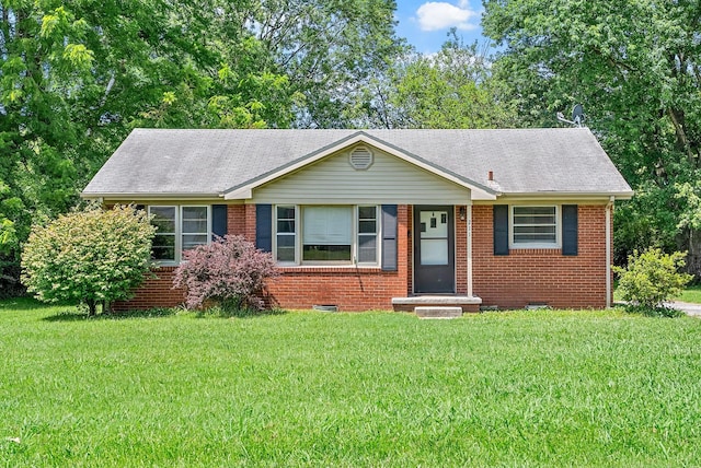 211 Navaho Trl, Hopkinsville, KY 42240 - single story home featuring a front yard, brick siding, and a shingled roof