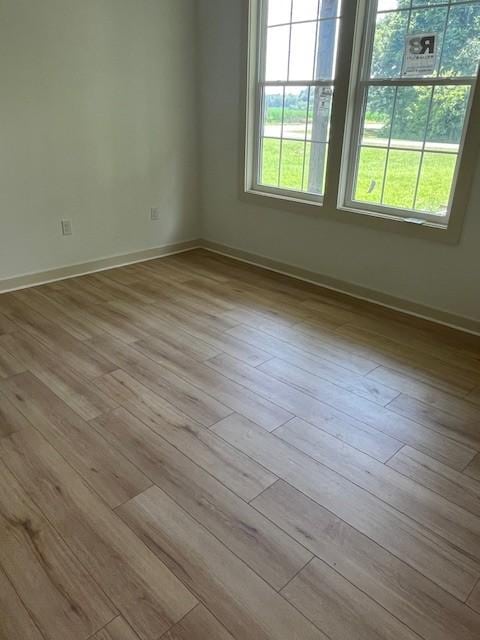 1798 Twin Caves Dr, Lewisburg, TN 37091 - spare room featuring wood finished floors and baseboards