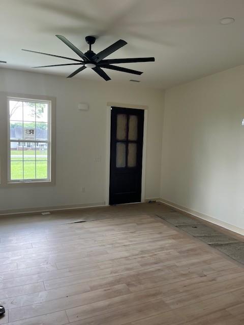 1798 Twin Caves Dr, Lewisburg, TN 37091 - unfurnished room with wood finished floors and ceiling fan