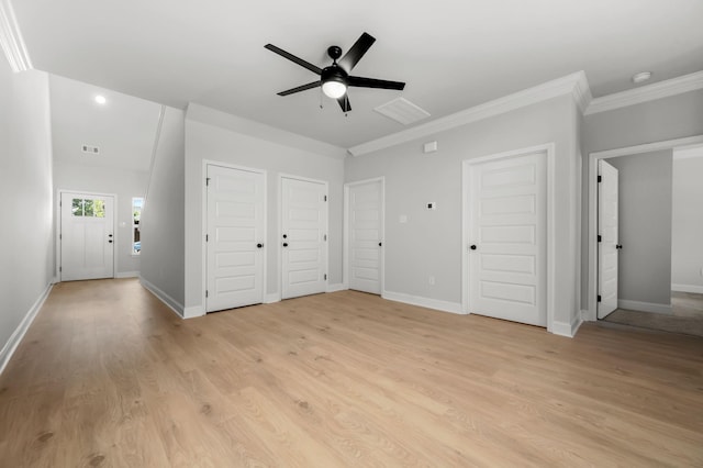 514 Rohan Dr, Murfreesboro, TN 37129 - unfurnished bedroom featuring multiple closets, ornamental molding, light wood-style flooring, and a ceiling fan