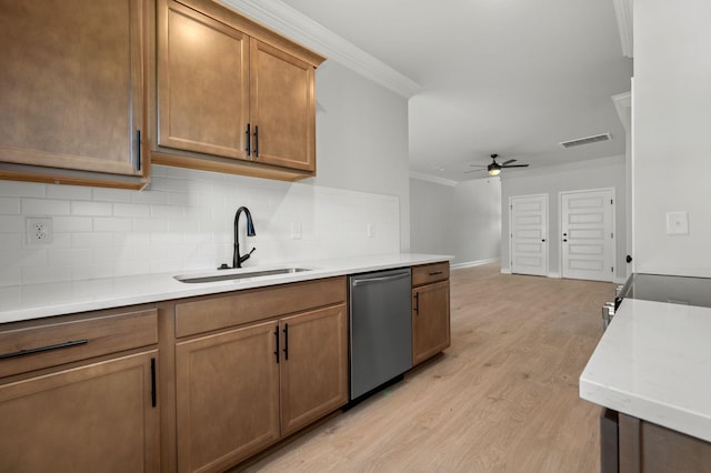 514 Rohan Dr, Murfreesboro, TN 37129 - kitchen with stainless steel appliances, crown molding, light wood-style floors, decorative backsplash, and a ceiling fan