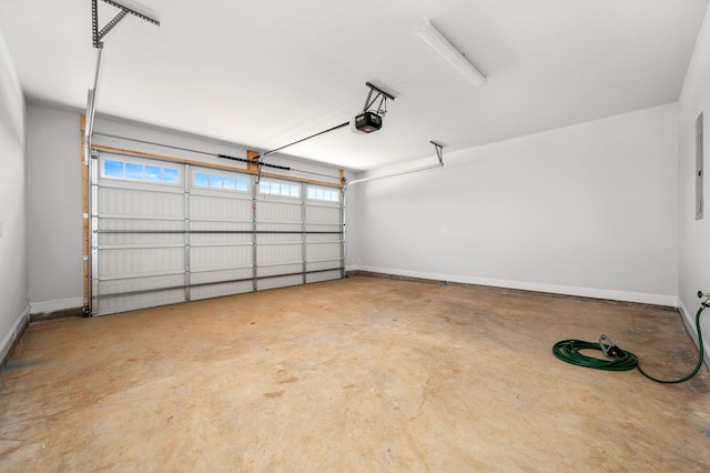 514 Rohan Dr, Murfreesboro, TN 37129 - garage with a garage door opener and baseboards