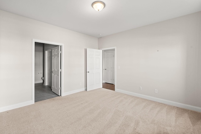 604 Douglas St, Lebanon, TN 37087 - unfurnished bedroom with carpet floors and ensuite bathroom