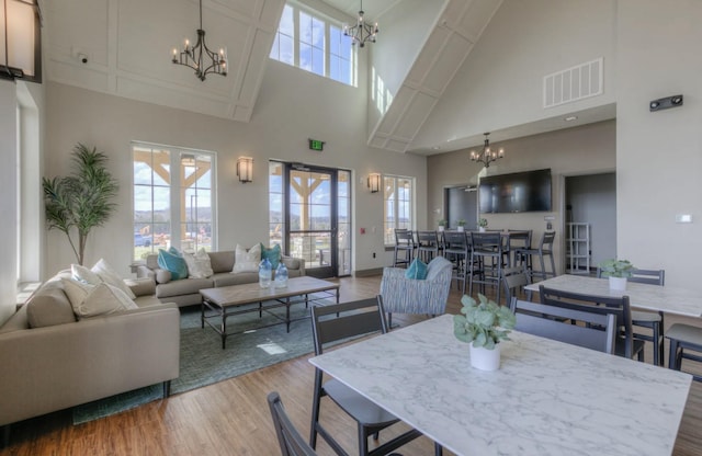 604 Douglas St, Lebanon, TN 37087 - living area with a chandelier, a high ceiling, and wood finished floors