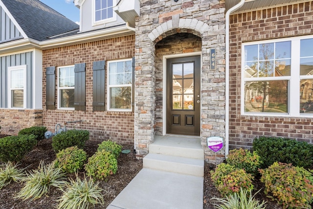 604 Douglas St, Lebanon, TN 37087 - entrance to property with a shingled roof, brick siding, and stone siding