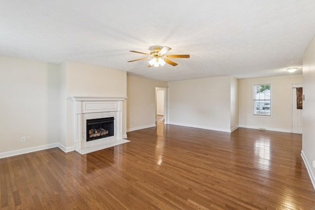 1011 Shirley Dr, Lebanon, TN 37087 - unfurnished living room with ceiling fan, wood finished floors, and a premium fireplace