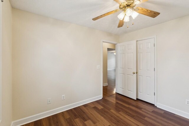 1011 Shirley Dr, Lebanon, TN 37087 - unfurnished bedroom with dark wood-type flooring, ceiling fan, and a closet